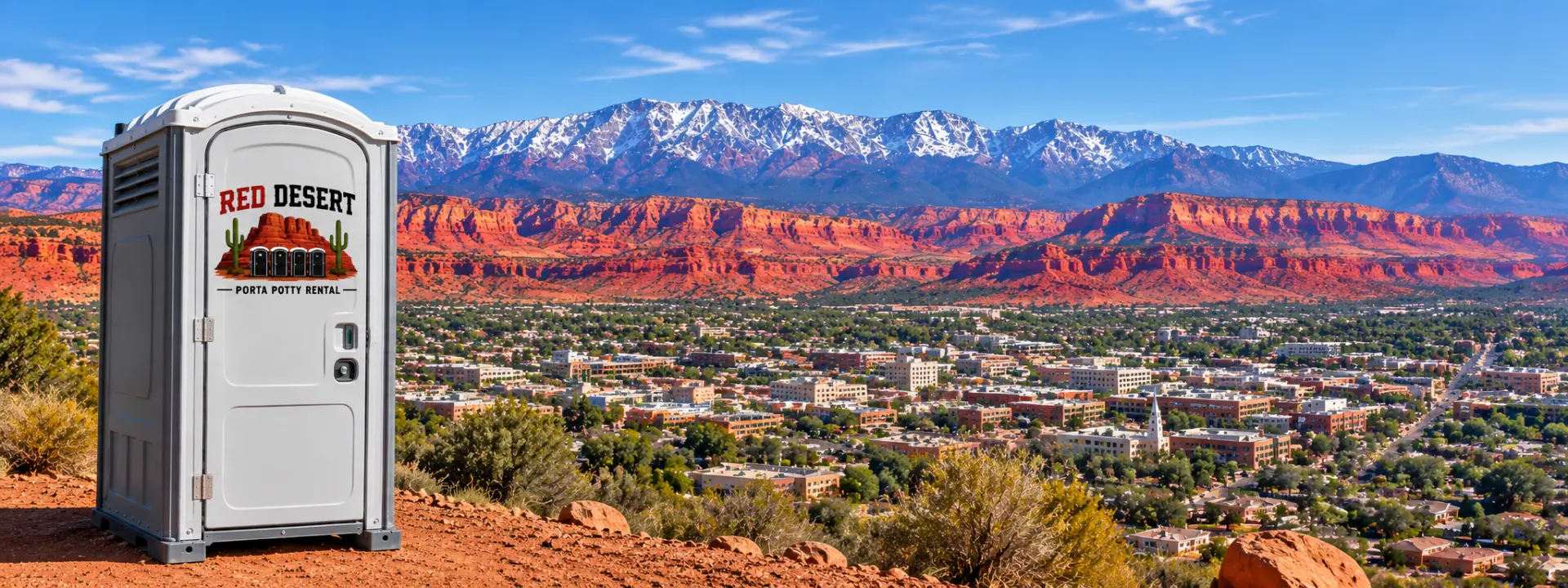 Red Desert Porta Potty Rental unit with St. George Utah and red rock mountains in the background